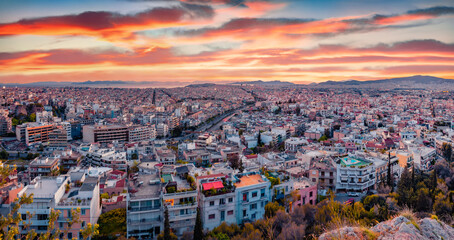 Aerial evening cityscape of Athens. Urban spring scene of Greece, Europe. Splendid sunset in the big sity. Traveling concept background.