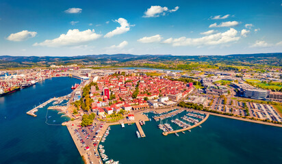 Incredible summer view from flying drone of Koper port. Aerial outdoor scene of Adriatic coastline, Slovenia, Europe. Stunning Mediterranean seascape. Traveling concept background. - obrazy, fototapety, plakaty