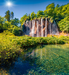 Extraordinary summer view of green forest with pure water waterfall in Plitvice National Park. Attractive morning scene of Croatia, Europe. Beauty of nature concept background.