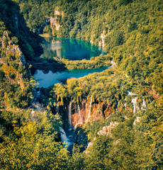 Aerial landscape photography. Fresh green view from flying drone of Plitvice National Park. Colorful spring scene of pure water lakes and waterfalls in Croatia, Europe. 
