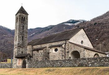 Medieval catholic parish Church of San Mamete with the bell tower in Mezzovico, Ticino, Switzerland.