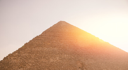 Banner travel Egyptian pyramids of Giza at sunset with sun lights Cairo, Egypt
