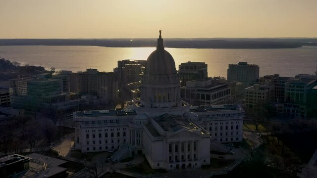 Madison State Capitol Building at Sunrise (Drone - Push in on Statue)