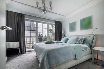 Stylish bedroom in aquamarine color