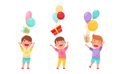 Set of happy boys holding balloons and gift boxes cartoon vector illustration