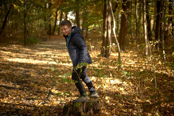 Boy and autumn in park