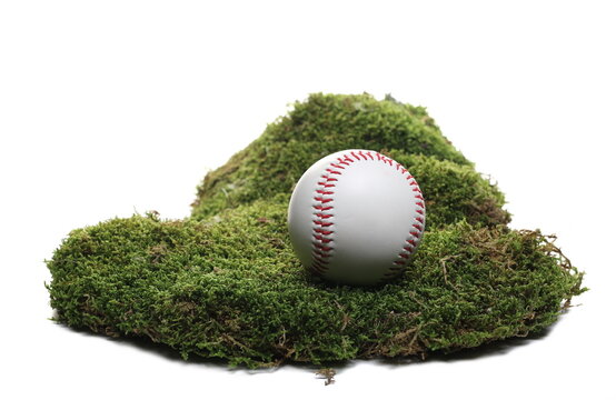 Baseball on green moss isolated on white  
