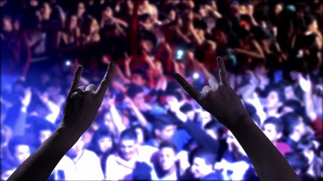 Close-Up of Horns Gesture Made by a Woman at Live Concert - 4K