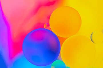 Abstract colorful Background Oil texture in Water surface with Bubbles micro shot close-up.