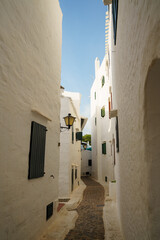 Binibeca, Menorca. September 2021. Nice town on the island of Menorca. Coastal town with all the houses painted white.