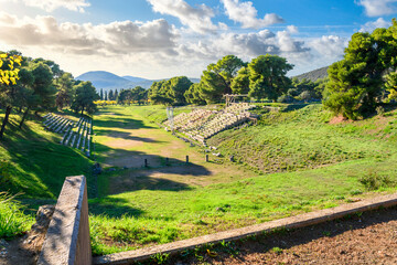 The 5th century Ancient Stadium arena of Epidaurus is located next to the Sanctuary of Asklepius in...