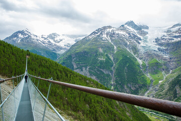 View of the alps as you cross the Charles Kuonen Suspension Bridge in Randa Switzerland; near Zermatt