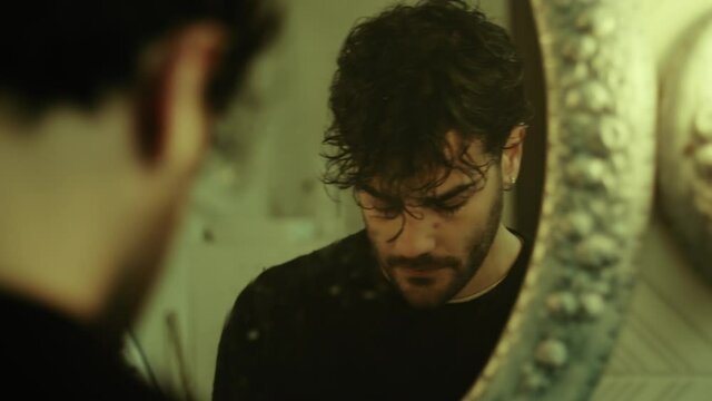 Mad boy in the bathroom making beard foam