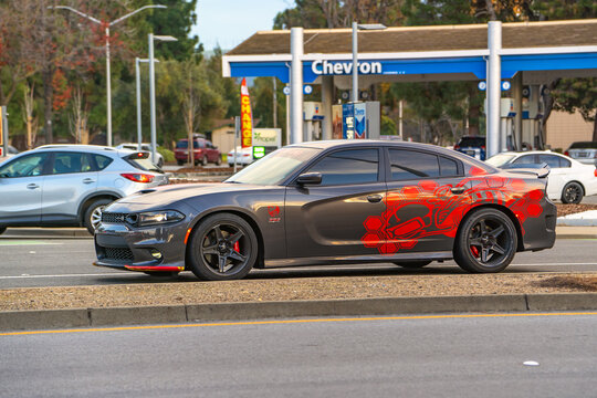 Dodge Challenger 392 Hemi Scat Pack with tuning rides on the road.
