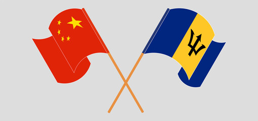 Crossed and waving flags of China and Barbados