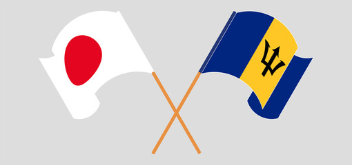 Crossed and waving flags of Japan and Barbados