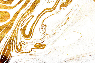 Golden swirl, artistic design. Suminagashi – the ancient art of Japanese marbling. Paper marbling is a method of aqueous surface design. White and gold paper texture. 