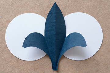 paper fleur-de-lis or fleur-de-lys shape on a circle motif