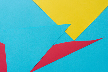 blue, yellow, and red paper background
