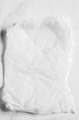 White empty crumpled baking paper background. Top view.