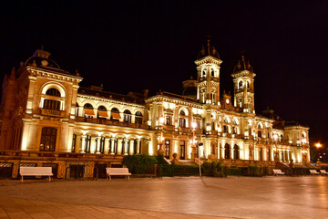 Fototapeta na wymiar City Hall of San Sebastian dressed in light. Illumination of the town hall.