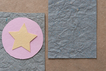 pale yellow paper star with design background
