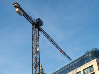 Fototapeta na wymiar Tower crane at a construction site in Berlin.