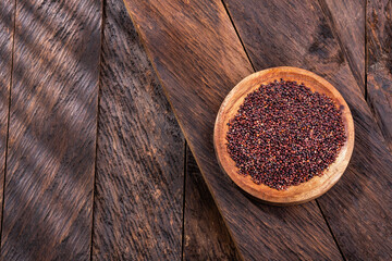 Black quinoa seeds in bowl - Chenopodium quinoa