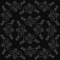 A pattern of wavy lines in white on a black background