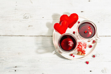 Hibiscus tea. The healthy hot organic drink is served in glass cups. St.Valentine's symbols