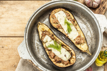 Stuffed eggplant ready to eat with ground meat, vegetables, and spices