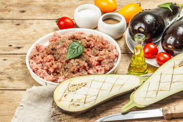 Stuffed eggplant ready to bake with ground meat, vegetables, and spices