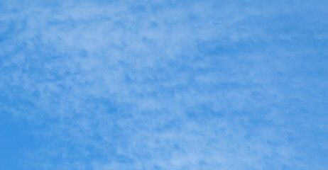 Background of blue sky with white clouds