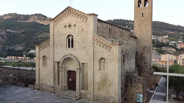 Aerial drone shot of a view of the church of San Michele Arcangelo in the medieval old town of Ventimiglia in Italy, Liguria, Italy. Beautiful panoramic aerial view vehicle of the Ligurian Riviera