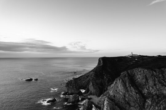 Dramatic black and white photo of Rock Lighthouse, Portugal.