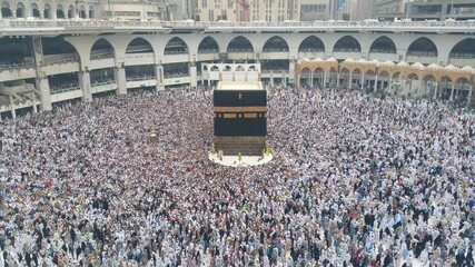 Muslim pilgrims from all around the world doing tawaf, praying around the kabah, during hajj