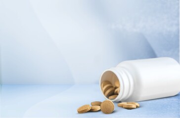 Concept of antiviral pill against coronavirus disease. COVID drugs on a medical table.