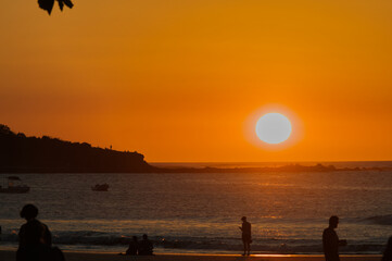 Fototapeta premium A sunset on the Costa Rican coast of Tamarindo.