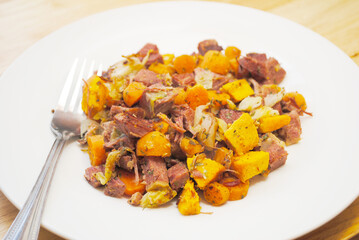 Corned Beef Hash with Sweet Potato and Carrots - obrazy, fototapety, plakaty