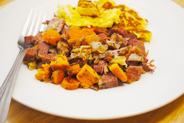 Corned Beef Hash with a Side Dish of Scrambled Eggs