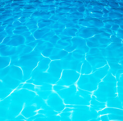 Fototapeta na wymiar Summer resort water ripple or water surface, under a beautiful sunny day.