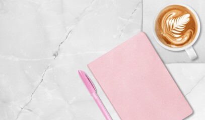 colored diary for the year 2022, pen, coffee latte. New year planning concept.