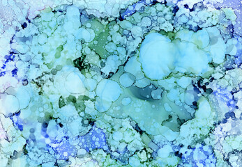 Exquisite blue-green fluid background. Wet fluid background of drops of blue and green transparent alcoholic ink. Spectacular texture imitating malachite.