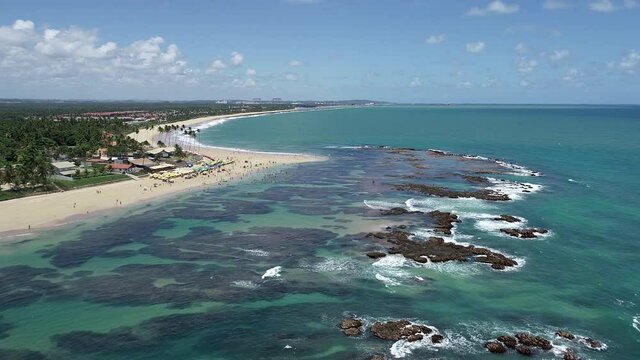 Coastal legendary travel destinations on tropical scenery of Porto de Galinhas Beach Pernambuco Brazil. Caribbean beach. Seascape bay water at famous travel destination in northeast brazil.