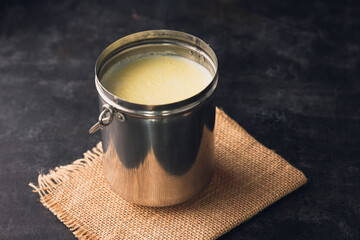 White thick layer of form over milk. Separate thick cream from milk. Curdled milk. Homogenized...
