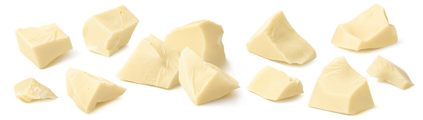 Big set of white chocolate pieces. Broken chunks isolated on white background.