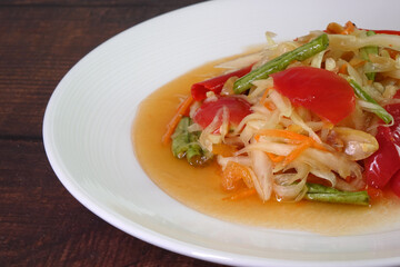Som tum salad, famous Thai spicy papaya salad