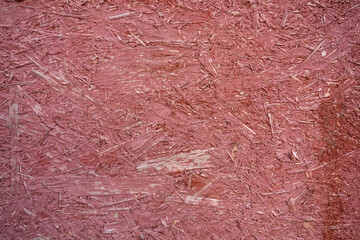 Background of chipboard in pink paint