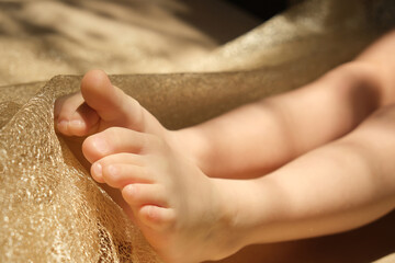 Close up bare foot in the morning at home, relaxing. Comfort aesthetics style. High contrast
