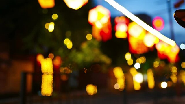 steet with out of focus lanterns as for festival background